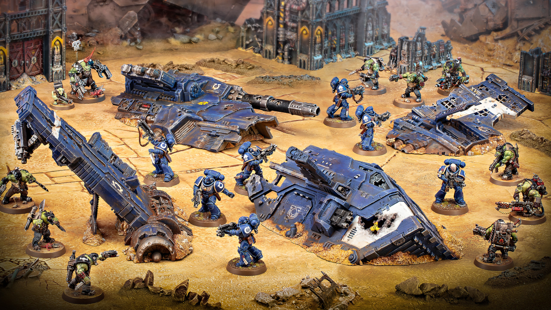 The crashed Thunderhawk Impact scenery kit, surrounded by Space Marine and Ork models