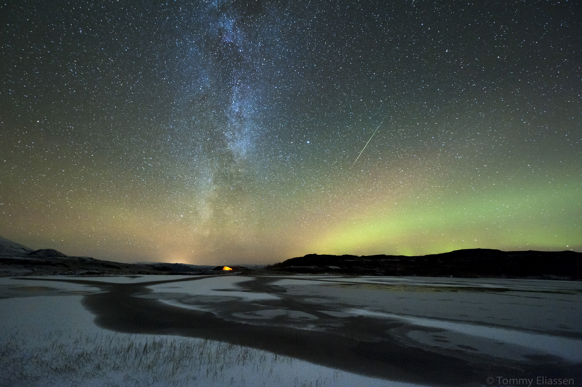 Photographer Tommy Eliassen captured this spectacular view of an Orionid meteor streaking through the dazzling northern lights and Milky Way from his camp in Korgfjellet, Hemnes, Norway, on Oct. 20, 2012, during the peak of the 2012 Orionid meteor shower.