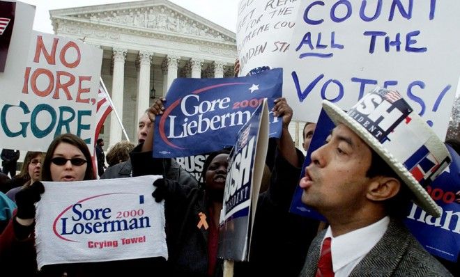 Supporters of Al Gore and George W. Bush face off against one another on Dec. 11, 2000 in front of the Supreme Court. 