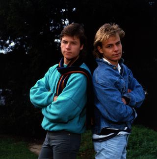 Guy Pearce and Jason Donovan as Mike Young and Scott Robinson in Neighbours back in the 1980s.