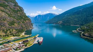 cruise ship docked in the Norwegian fjords