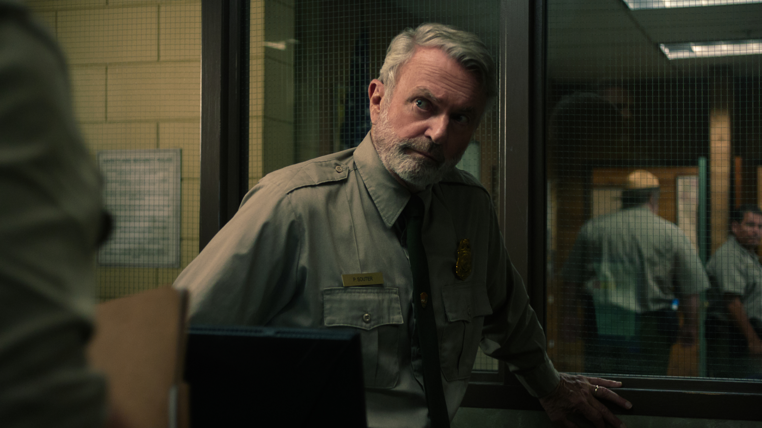 Paul Souter (Sam Neill) in uniform in a scene from Netflix's "Untamed"