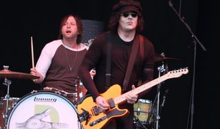 (from left) Patrick Keeler and Jack White from The Raconteurs perform live on stage during the All Points East Festival at Victoria Park in London in 2019