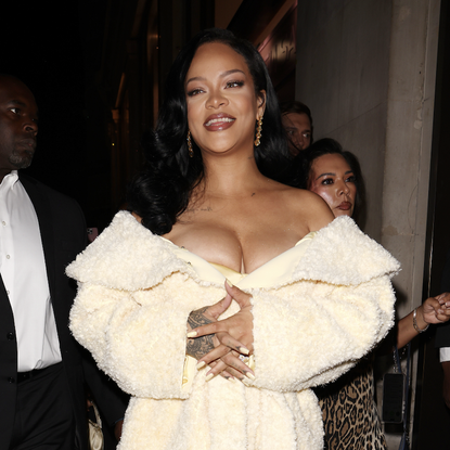 Rihanna attends the launch of Fenty Hair exclusively at Selfridges on September 16, 2024 in London, England wearing a shearling coat