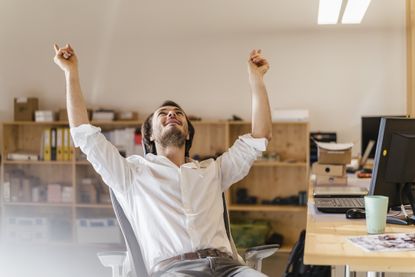 Man cheering a victory