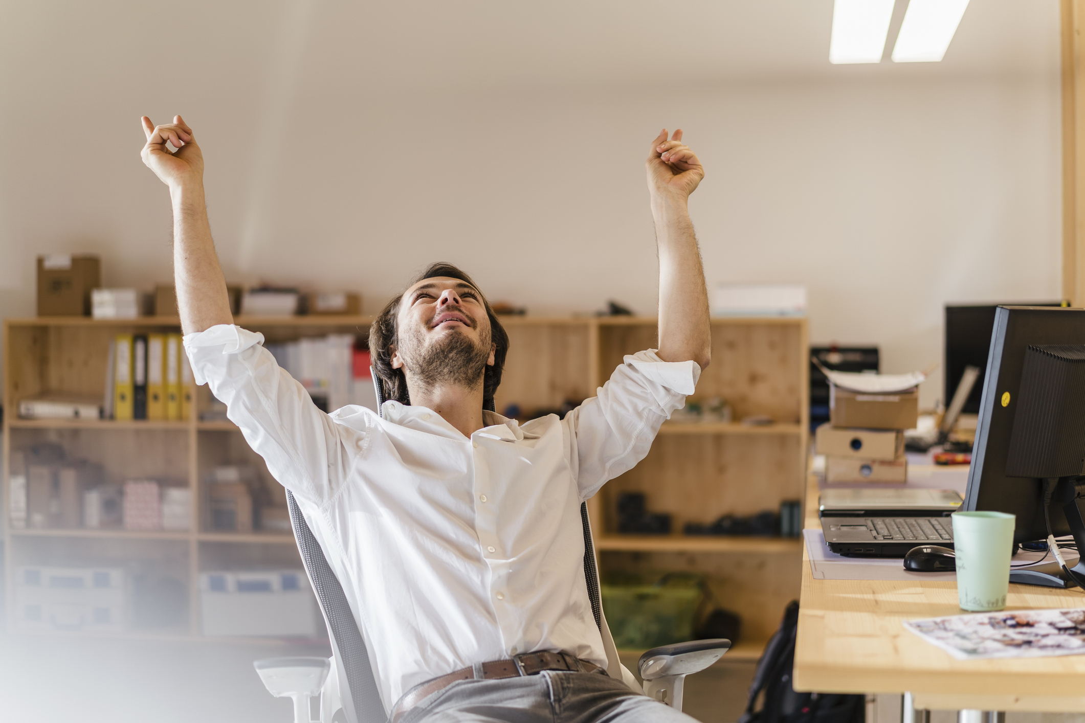 Man cheering a victory