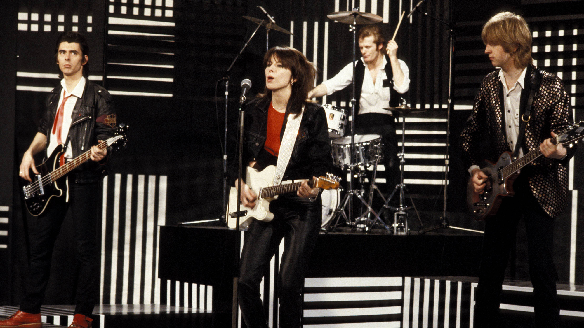 The Pretenders perform on 'The Kenny Everett Video Cassette' TV show in 1981. (from left) Martin Chambers, Chrissie Hynde, James Honeyman-Scott