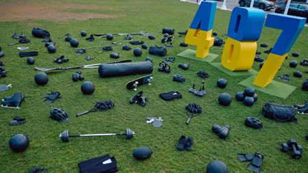 Sporting equipment representing the disciplines of some of the 487 fallen Ukrainian athletes, are pictured in Parliament Square, opposite the Houses of Parliament in central London on July 24, 2024