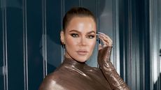 Khlo&eacute; Kardashian on a navy background