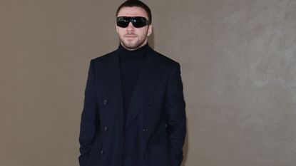 Rocco Ritchie in all black and sunglasses