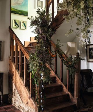 Christmas garland with fruit around a staircase