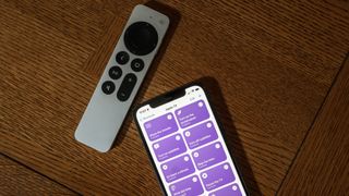 Apple TV remote and iPhone with shortcuts