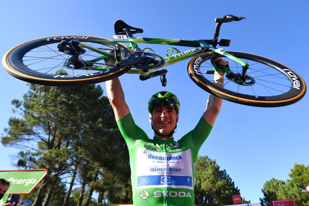 MOS SPAIN SEPTEMBER 04 Fabio Jakobsen of Netherlands and Team Deceuninck QuickStep celebrates after crosses the finishing line the 76th Tour of Spain 2021 Stage 20 a 2022km km stage from Sanxenxo to Mos Alto Castro de Herville 502m lavuelta LaVuelta21 on September 04 2021 in Mos Spain Photo by Stuart FranklinGetty Images