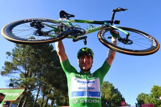 MOS SPAIN SEPTEMBER 04 Fabio Jakobsen of Netherlands and Team Deceuninck QuickStep celebrates after crosses the finishing line the 76th Tour of Spain 2021 Stage 20 a 2022km km stage from Sanxenxo to Mos Alto Castro de Herville 502m lavuelta LaVuelta21 on September 04 2021 in Mos Spain Photo by Stuart FranklinGetty Images
