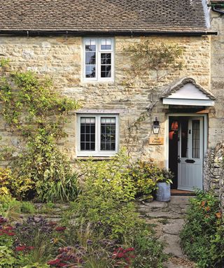 exterior of Cotswolds stone cottage with porch
