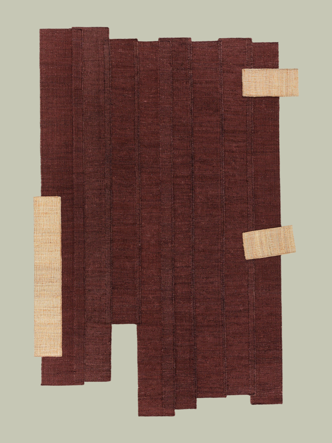 An irregular brown rug from CC-Tapis