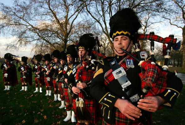 Bagpipe players.