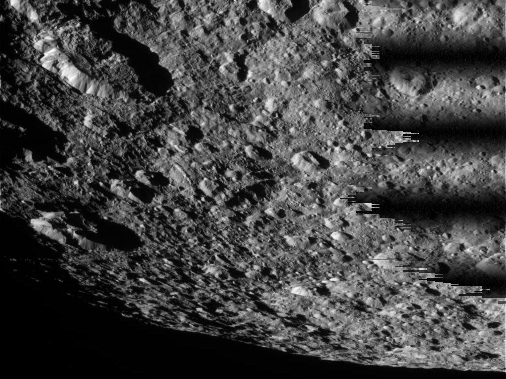 A closeup view of the cratered surface of Saturn's moon Rhea, captured by NASA's Cassini spacecraft on March 10, 2012. The camera was pointing toward Rhea at 26,257 miles (42,258 kilometers) away.