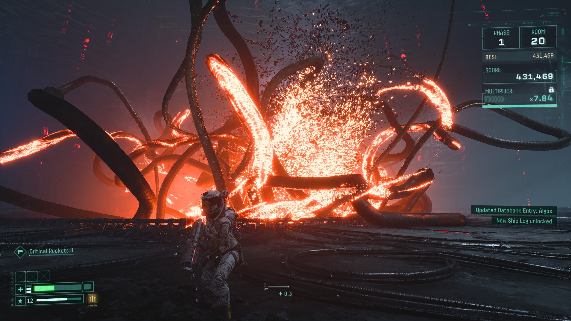 The flaming tentacles of a defeated boss in Returnal.