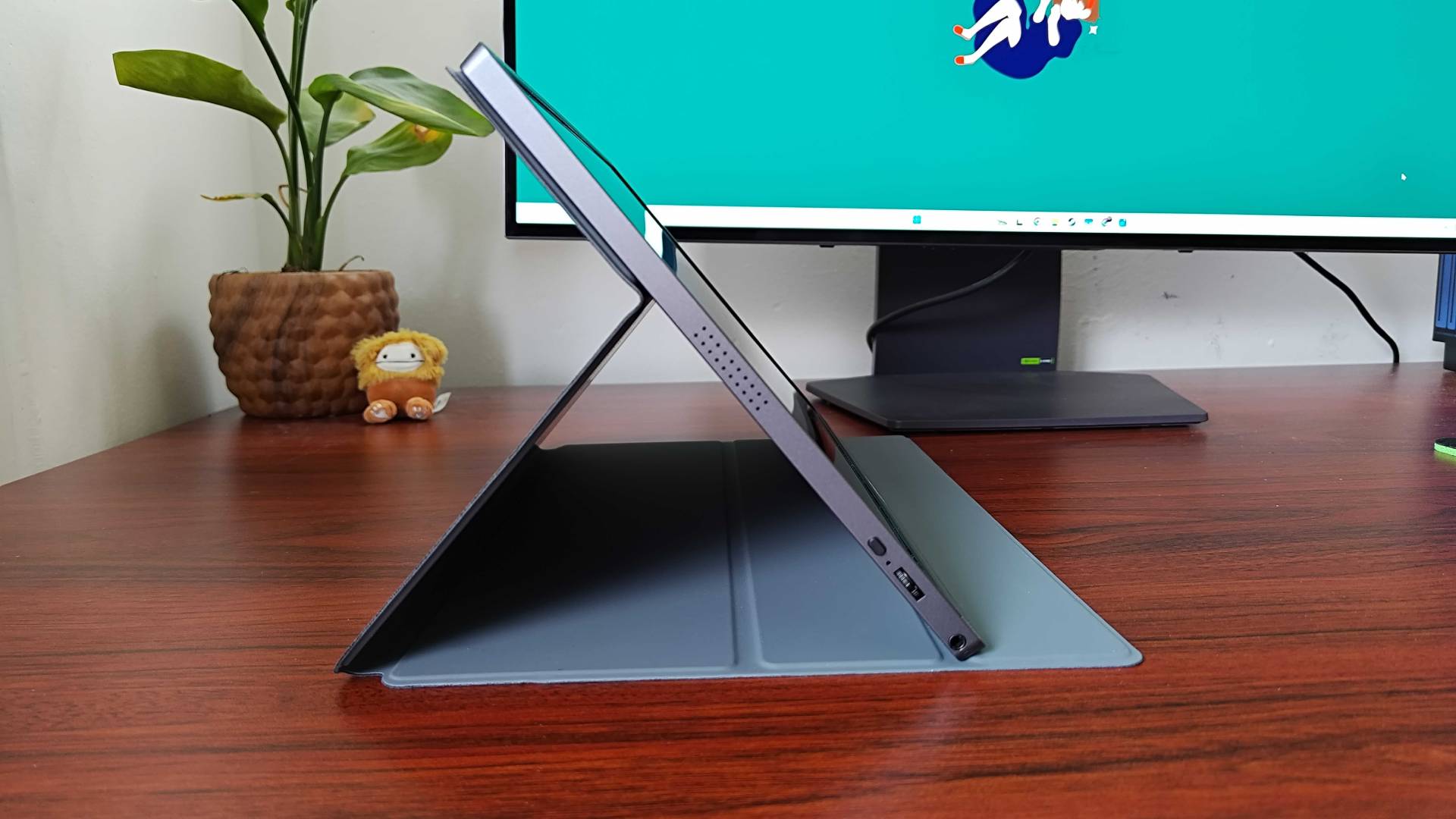 Side view of KYY K3 Portable monitor with stand propped up.