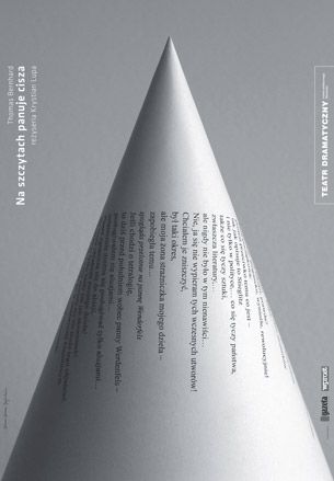 Cone shaped paper against grey background with black text