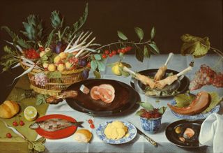 Table filled with meat, fruit and vegetables
