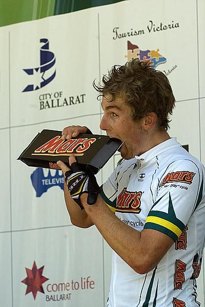 A mars a day&hellip;Sprint and King of the Mountains Champion Benjamin King (Trek Livestrong) bites into one of the sponsors products on the podium in Buninyong.