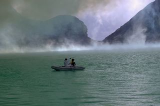 Researchers study highly acidic Ijen Crater Lake.