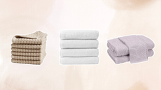 Three Nordstrom bath towels on a light brown background