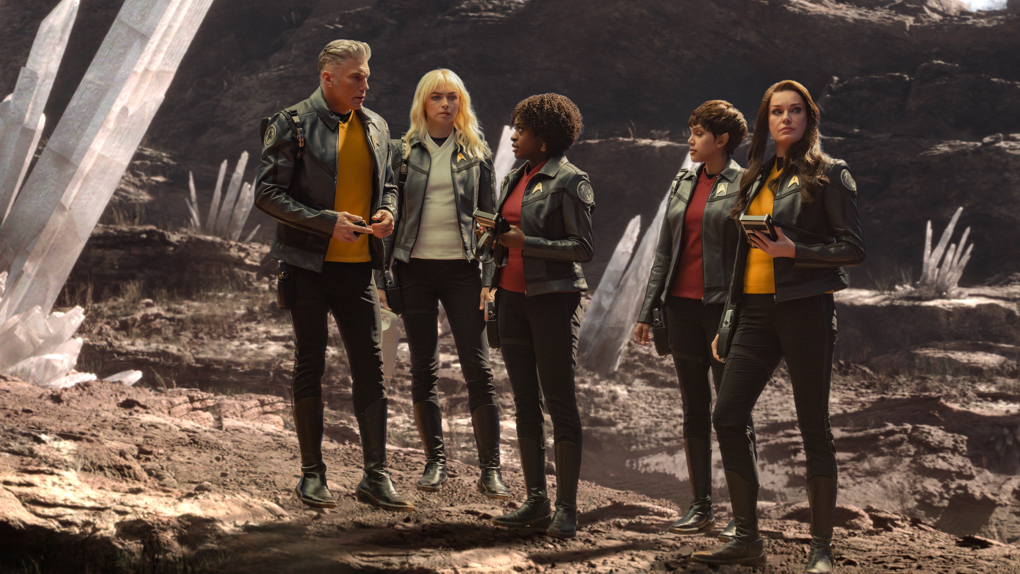 (L-R): Anson Mount as Captain Pike, Jess Bush as Christine Chapel, Celia Rose Gooding as Uhura, Bianca Nugara as A'Sha, and Rebecca Romijn as Una in Star Trek: Strange New Worlds, episode 8, season 4