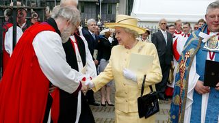 Queen Elizabeth Shaking Hands With Doctor Rowan Williams, Archbishop Of Canterbury, After Attending A Special Service To Commemorate The 50th Anniversary Of Her Coronation