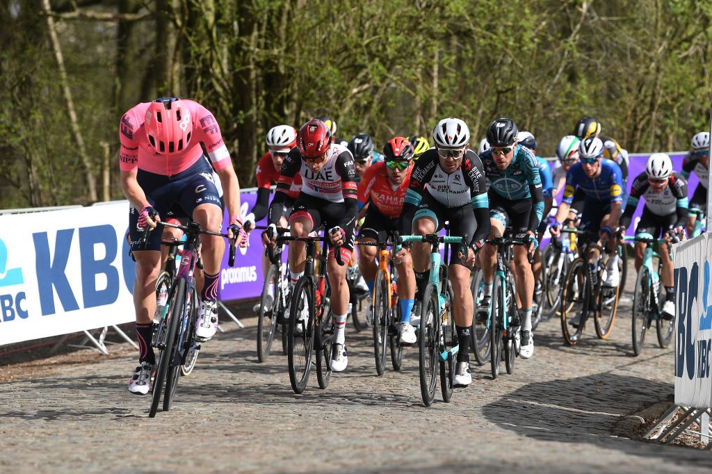 WEVELGEM BELGIUM MARCH 28 Jonas Rutsch of Germany and Team EF Education Nippo Sven Erik Bystrom of Norway and UAE Team Emirates Jack Bauer of New Zealand and Team Team BikeExchange during the 83rd GentWevelgem in Flanders Fields 2021 Mens Elite a 254km race from Ypres to Wevelgem Kemmelberg Belvedre Cobblestones GWE21 GWEmen FlandersClassic on March 28 2021 in Wevelgem Belgium Photo by Tim de WaeleGetty Images