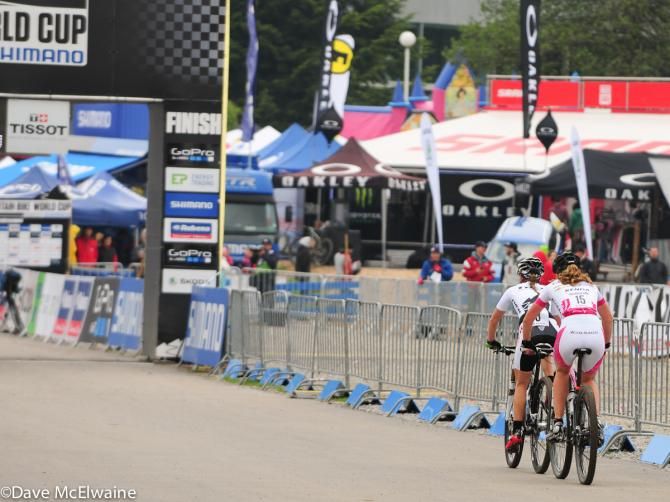 Andreas Waldis (Team Colnago Sudtirol) marking Bec Henderson (Trek Factory Racing) with one lap to go