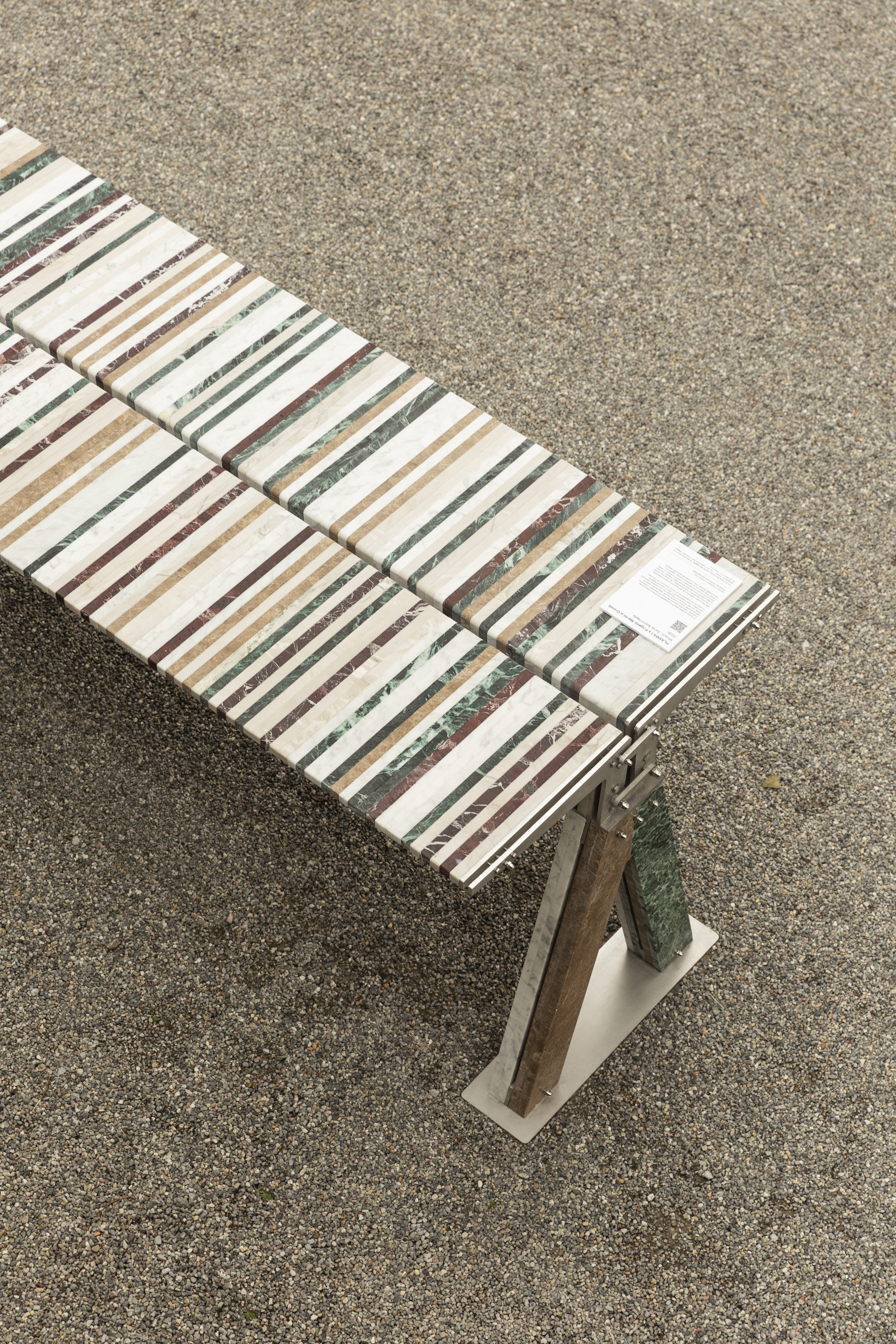 Table made of many stripes of marble