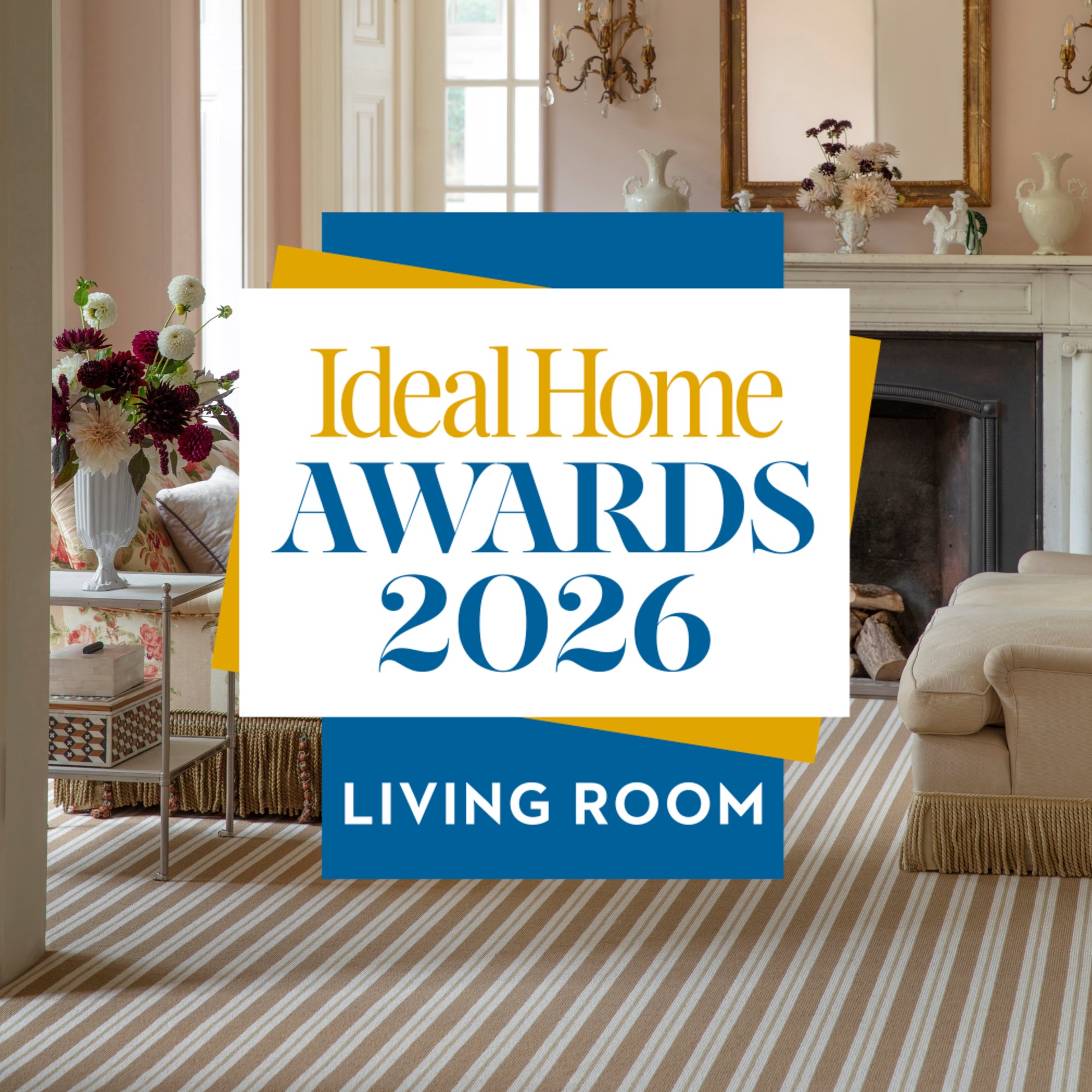 A pink-painted period living room with Alternative Flooring's Wool Candy striped carpet and the Ideal Home Awards 2026 logo on top