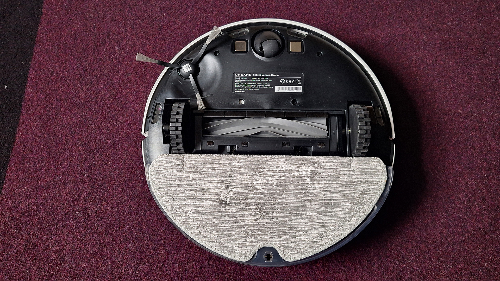 Dreame D9 Max Gen 2 robot vacuum flipped over to show mop pad