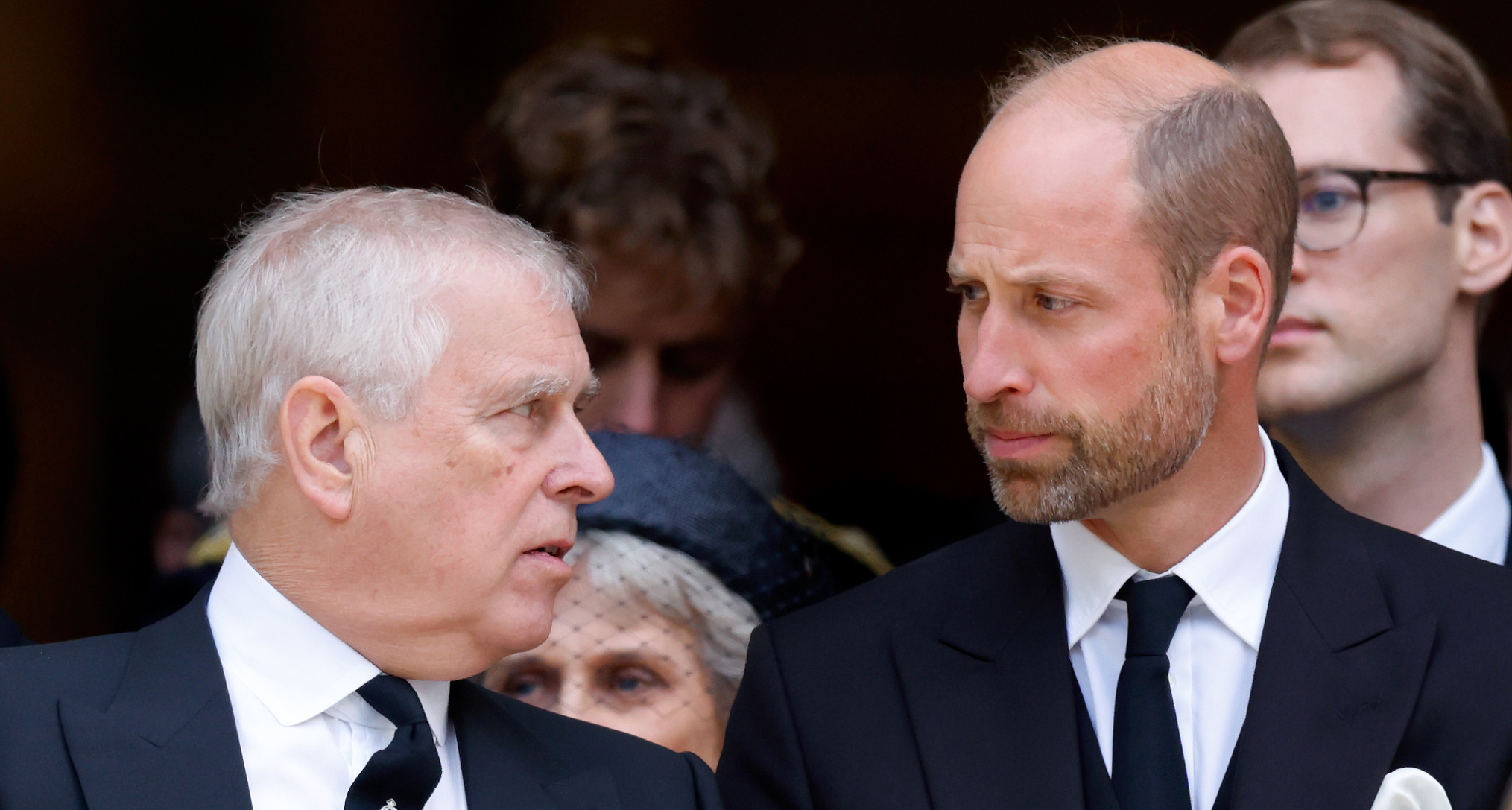 Prince Andrew talking to Prince William at the Duchess of Kent's funeral