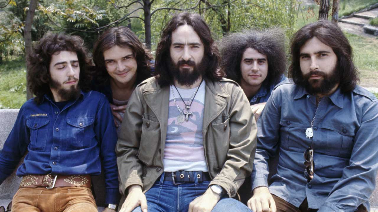 PFM in 1975 sitting on a park bench 
