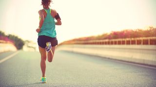 A photo of a female running in the best women's running shoes 