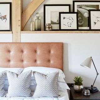 guest bedroom with lamp and bed linen