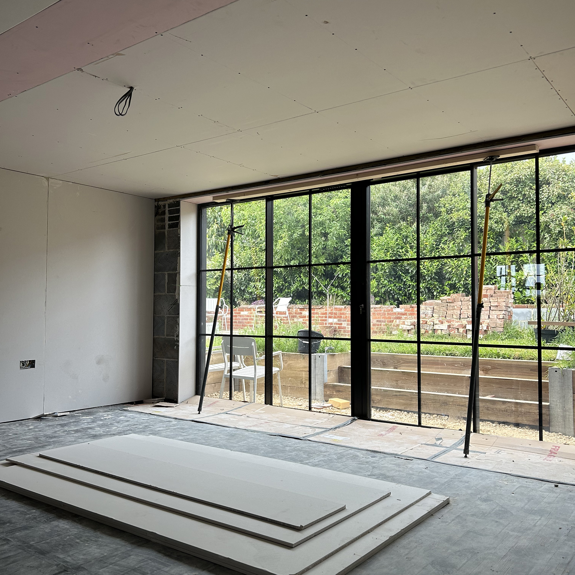 sliding doors installed in a partly-finished extension