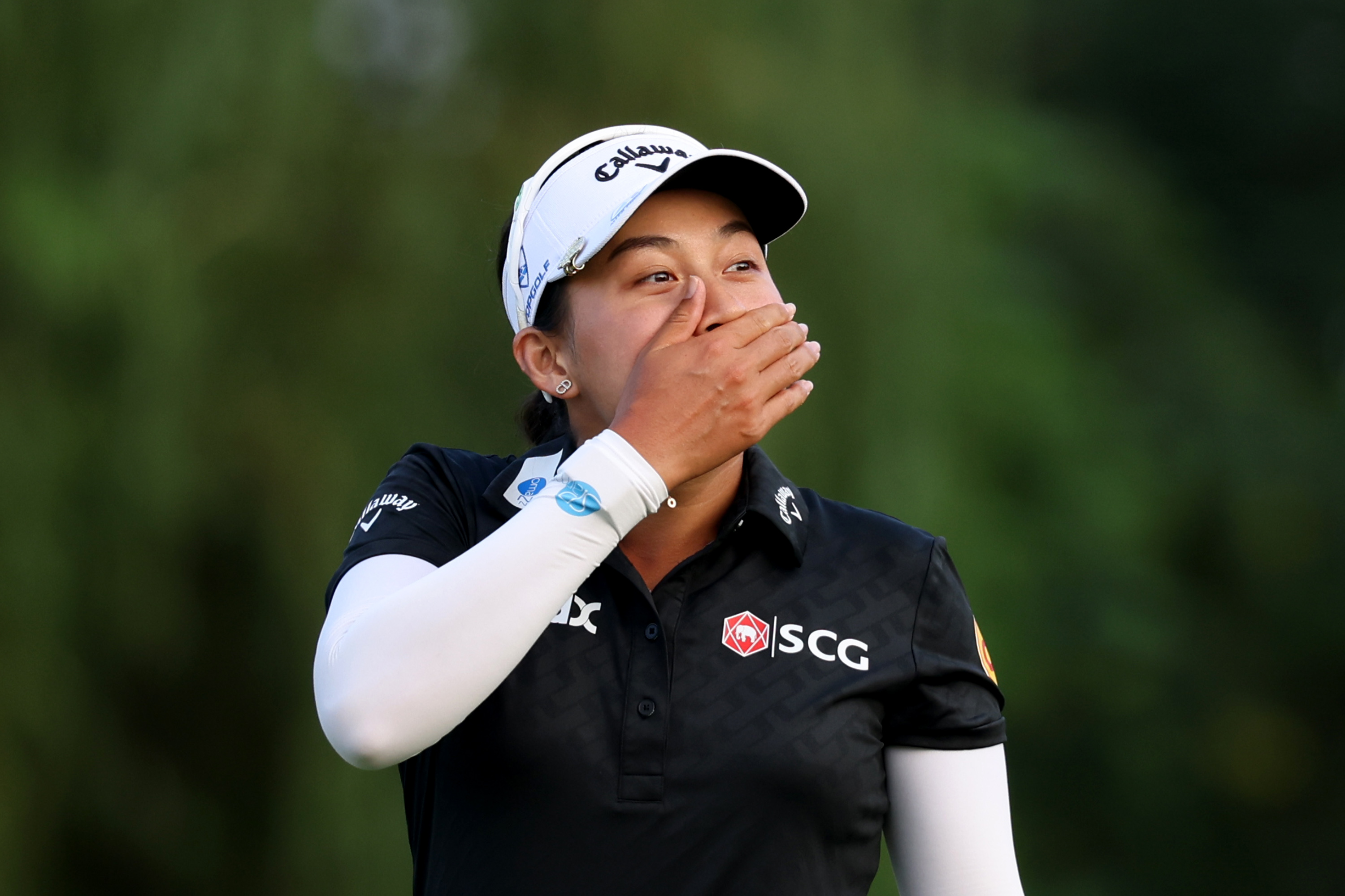 Jeeno Thitikul covers her mouth with her hand after winning the 2025 Buick LPGA Shanghai