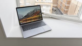 The Apple MacBook Pro 13in (2018) with the lid open