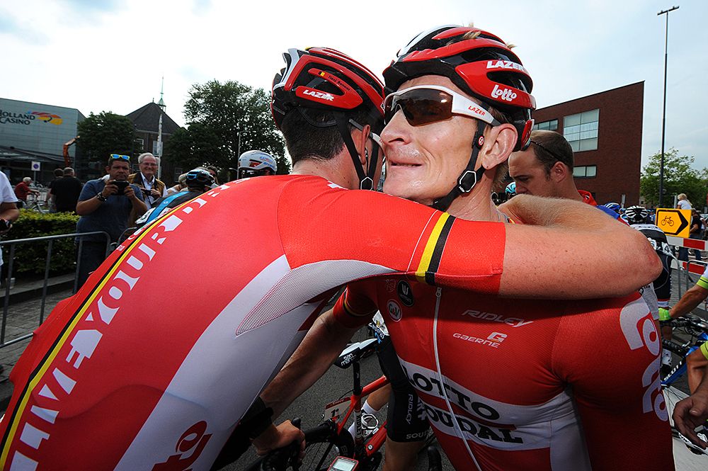Andr&eacute; Greipel (Lotto-Soudal) gets hugs from his teammates after winning stage 2