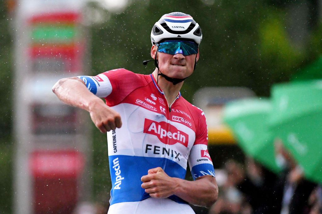 LACHEN SWITZERLAND JUNE 07 Mathieu Van Der Poel of Netherlands and Team AlpecinFenix stage winner celebrates at arrival during the 84th Tour de Suisse 2021 Stage 2 a 178km stage from Neuhausen am Rheinfall to Lachen Rain UCIworldtour tds tourdesuisse on June 07 2021 in Lachen Switzerland Photo by Tim de WaeleGetty Images