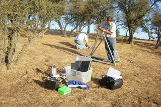 Setting up surface sensors to record seismic waves after 2010 earthquake in Chile.