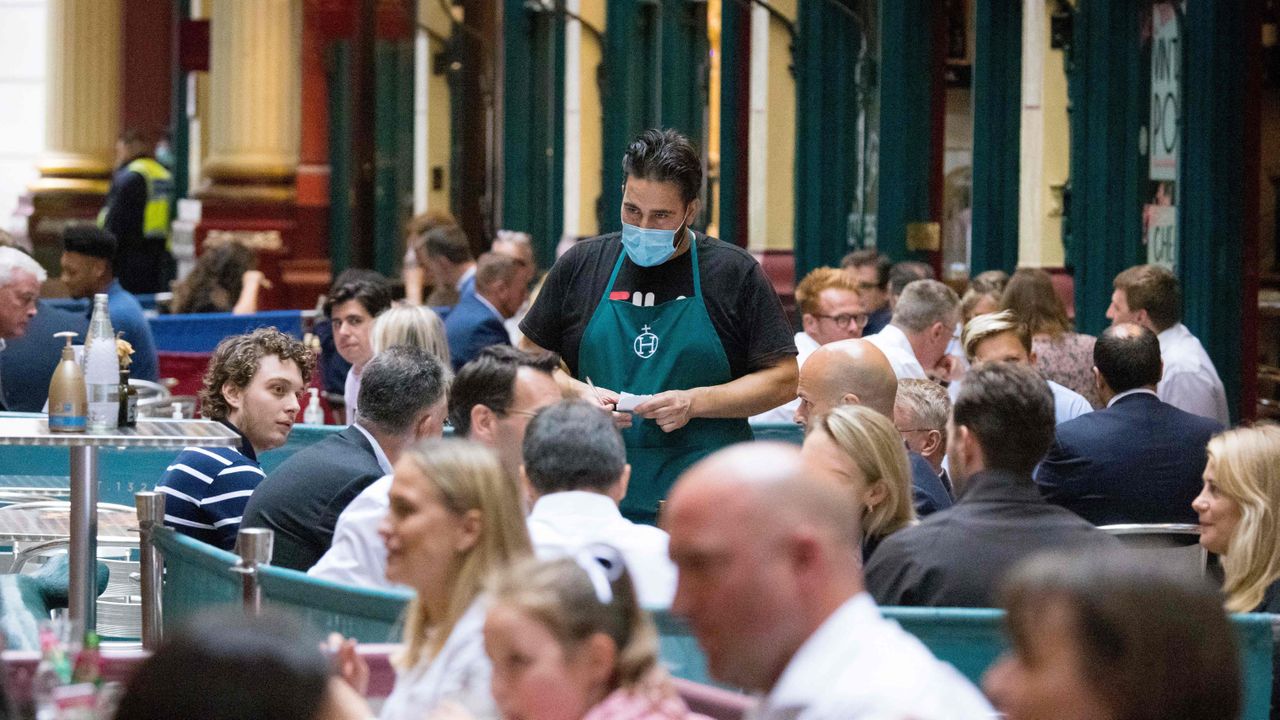 Waiter working in a London cafe