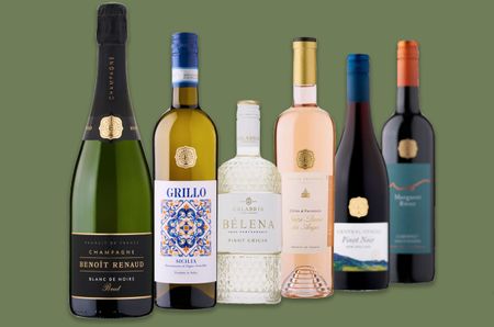 Asda wine bottles on green background