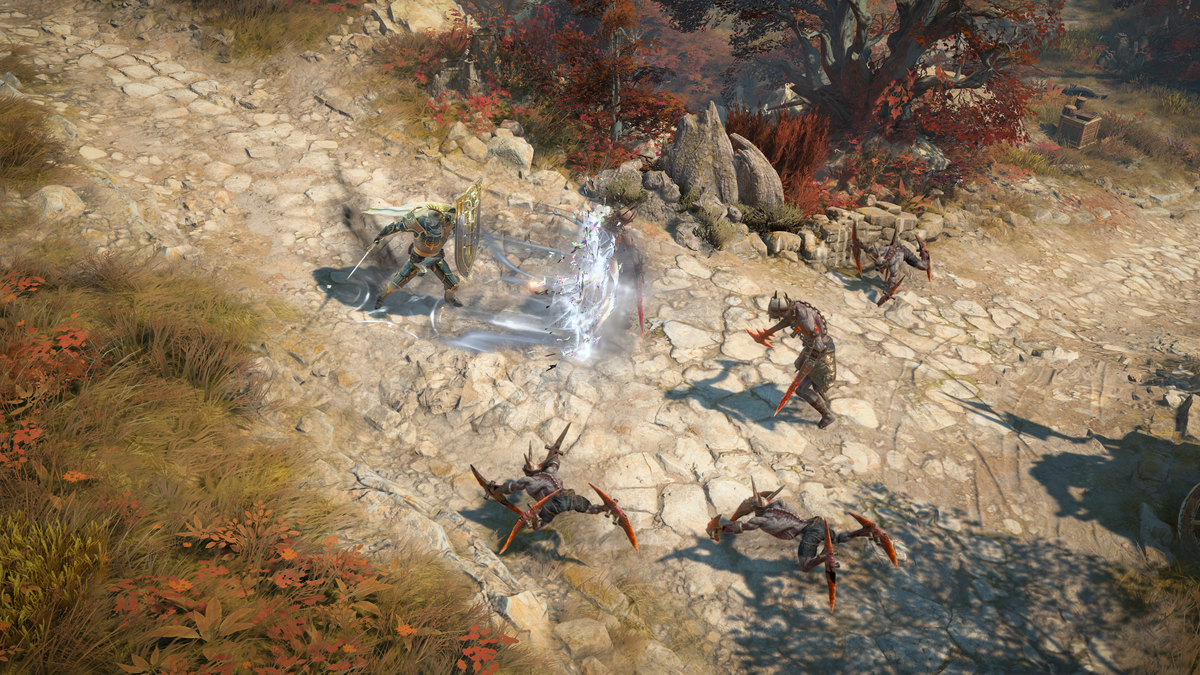 A promotional screenshot of the paladin class in Diablo 4: Lord of Hatred. A paladin character holds their shield up against a pack of demons and sends forth a spectral copy of it.