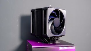 A Cooler Master Hyper 612 Apex on a desk and installed on a gaming PC.
